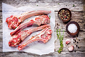 Raw lamb meat ribs with garlic and thyme