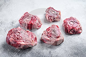 Raw lamb neck meat on cooking table..White background. Top view