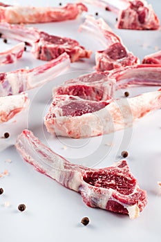 raw lamb ribs on a light background