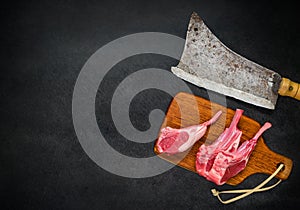 Raw Lamb Ribs with Meat Cleaver and Copy Space