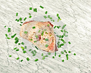 Raw Lamb Sprinkled With Chives Ready To Roast