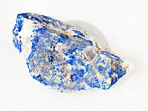 raw Lazurite (Lapis Lazuli) stone on white