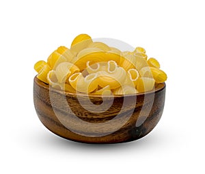 Raw macaroni pasta with wooden bowl isolated on white background