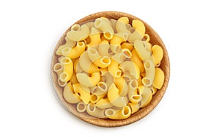 raw macaroni pasta in wooden bowl isolated on white background with clipping path and full depth of field. Top view