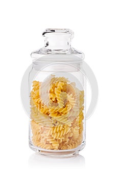 Raw macaronies in a glass jar