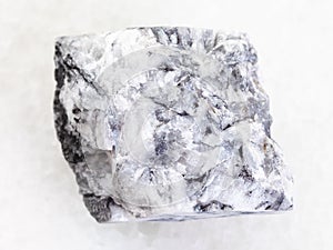 raw magnesite stone on white marble