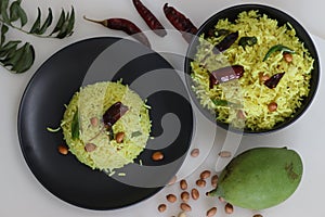 Raw mango rice shot on white background