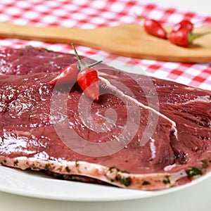 Raw marinated beef fillets