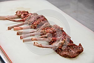 Raw marinated lamb meat