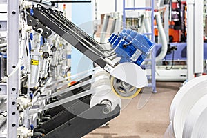 Raw material plastic roll set on feed set of high technology modern and automatic high speed continuous manufacturing process