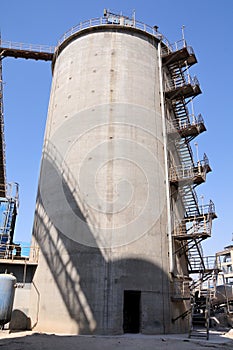 Raw materials storage in factory with steel stairs