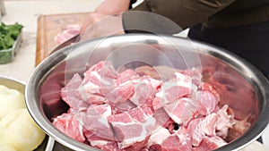 Raw meat close up, pork tenderloin filet cut into pieces