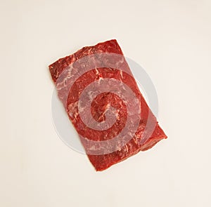 Raw meat on the wooden board photo