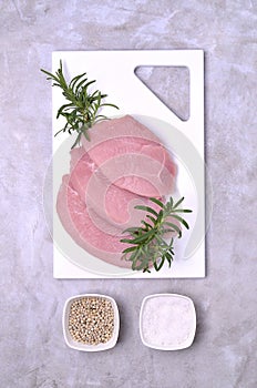 Raw meat fillet with spices