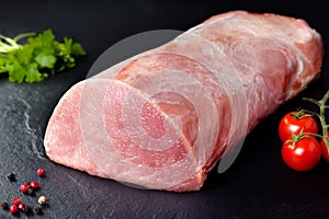 Raw meat and fresh pork. Roll uncooked pork, pork loin photo