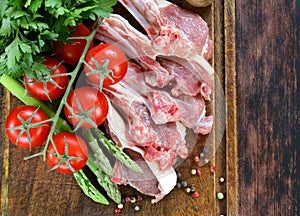 Raw meat, lamb chops with vegetables