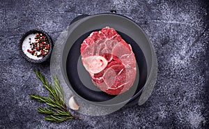 Raw meat osso buco with spices