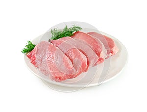 Raw Meat. Pork Steaks With Dill on a Dish Isolated against White Background