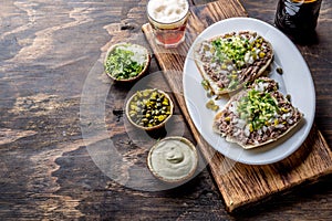 Raw meat sandwiches. CRUDO VALDIVIANO. tipical chilean food from region Valdivia. Chilean food, aleman food. Tartar photo