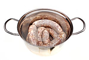 Raw meat sausages isolated
