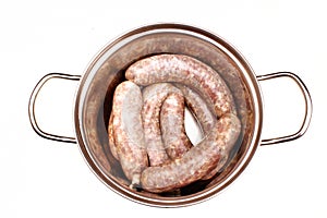 Raw meat sausages isolated