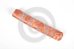 Raw meat sausages isolated on white background
