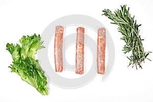 Raw meat sausages isolated on white background