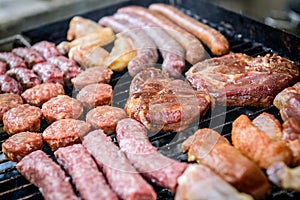 Raw Meat skewer on barbecue grill with coal