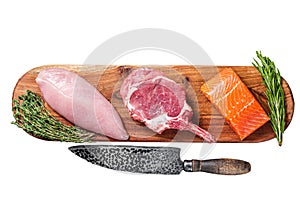 Raw meat steaks - fish salmon, beef veal and turkey. Isolated on white background, top view.