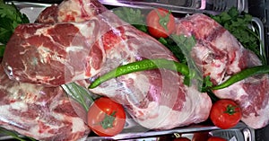 Raw Meat in a Supermarket with Vegetables