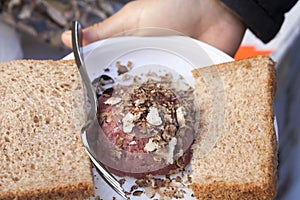 Raw meat with truffles and bread
