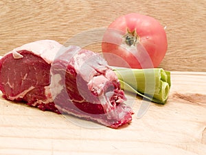 Raw meat with vegetables