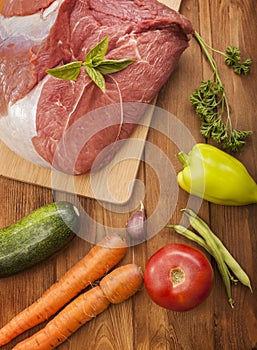 Raw meat and vegetables