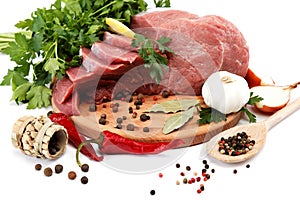 Raw meat, vegetables and spices.