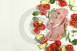 Raw meat, vegetables and spices on white background