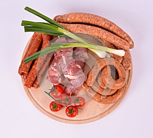 Raw Meat on Wooden Board