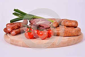 Raw Meat on Wooden Board