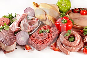 Raw meats on white background- roast beef, sausage, minced beef, chicken, lamb chop