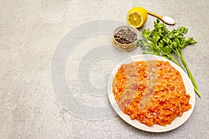 Raw minced red fish stuffing on a stone background. Ingredient for making fish-balls, casseroles, terrine, pate. Spices, salt,