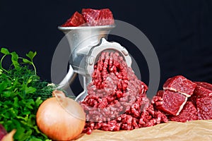 Raw Mincer with fresh minced beef meat photo