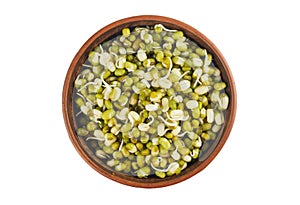 Raw mung beans sprouts in ceramic bowl on white background