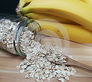 Raw oatmeal is scattered on the desk