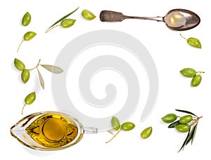 Raw olives and olive oil, top view.
