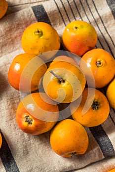 Raw Orange Organic Tejocote Apples photo