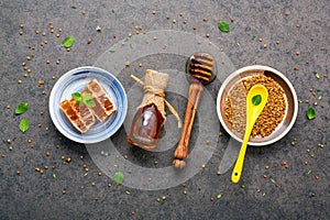 Raw organic bee pollen on dark stone background. Bee pollen gran