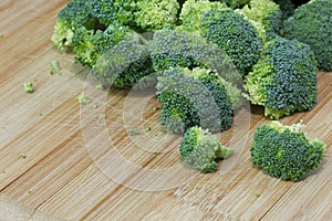 Raw Organic Broccoli on a Wooden Cutting Board