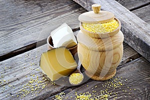 Raw organic polenta corn meal in a wooden bowl