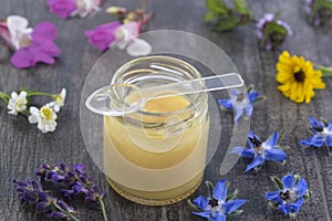 Raw organic royal jelly in a small bottle