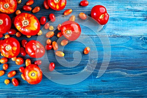 Raw, organic tomatoes with available copy space.