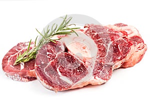 Raw osso buco on a white background